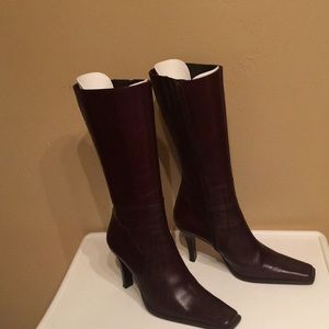Leather hi heel boots. Used in good condition.